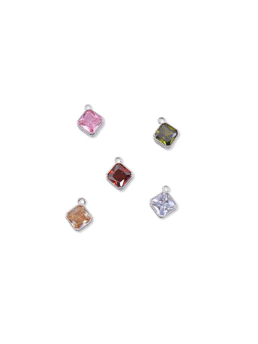 Five square-shaped gemstone pendants in various colors on a white background